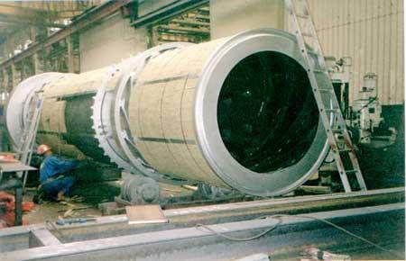 The material put inside the cylinder is conveyed along the rotary dryer based on the changes in the inclination angle of the cylinder and blades installed in the cylinder which provokes the turning