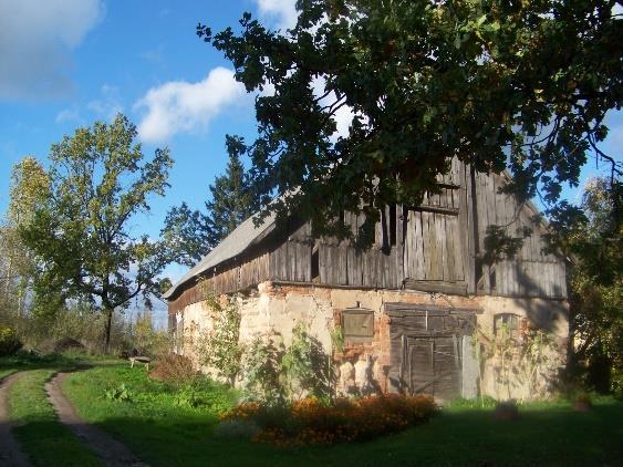 Jaunsvirlaukas Parish [Source: photo by author, 2013] Fig. 9. The old cattle-shed has retained its rubble masonry, mortar finish, and the vertical plank pattern in the attic.