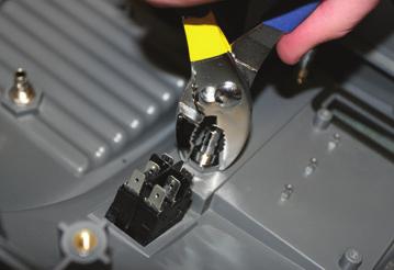 Disconnect the electrical cord s wires from the PCB. 4. Release the strain relief surrounding the power cord on the back cabinet using strain relief pliers. 5.