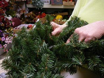 When finished, there should be some pointing toward the middle, and some pointing toward the outside of your wreath.