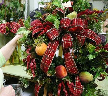 Oops! After stepping back and looking at the wreath, I realized that the left side needed another sprig of
