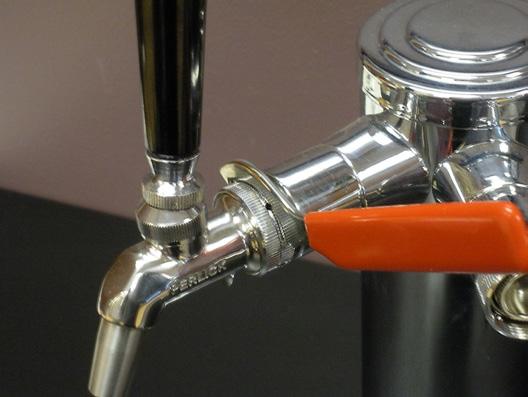 To tap a keg, insert the coupler into the fitting on top of the barrel. Turn the coupler clockwise until it stops (about 1/8 turn).