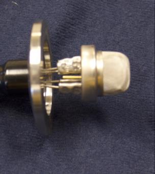 The vacuum sensor assembly is designed to mount directly into a mating KF-25 vacuum fitting.