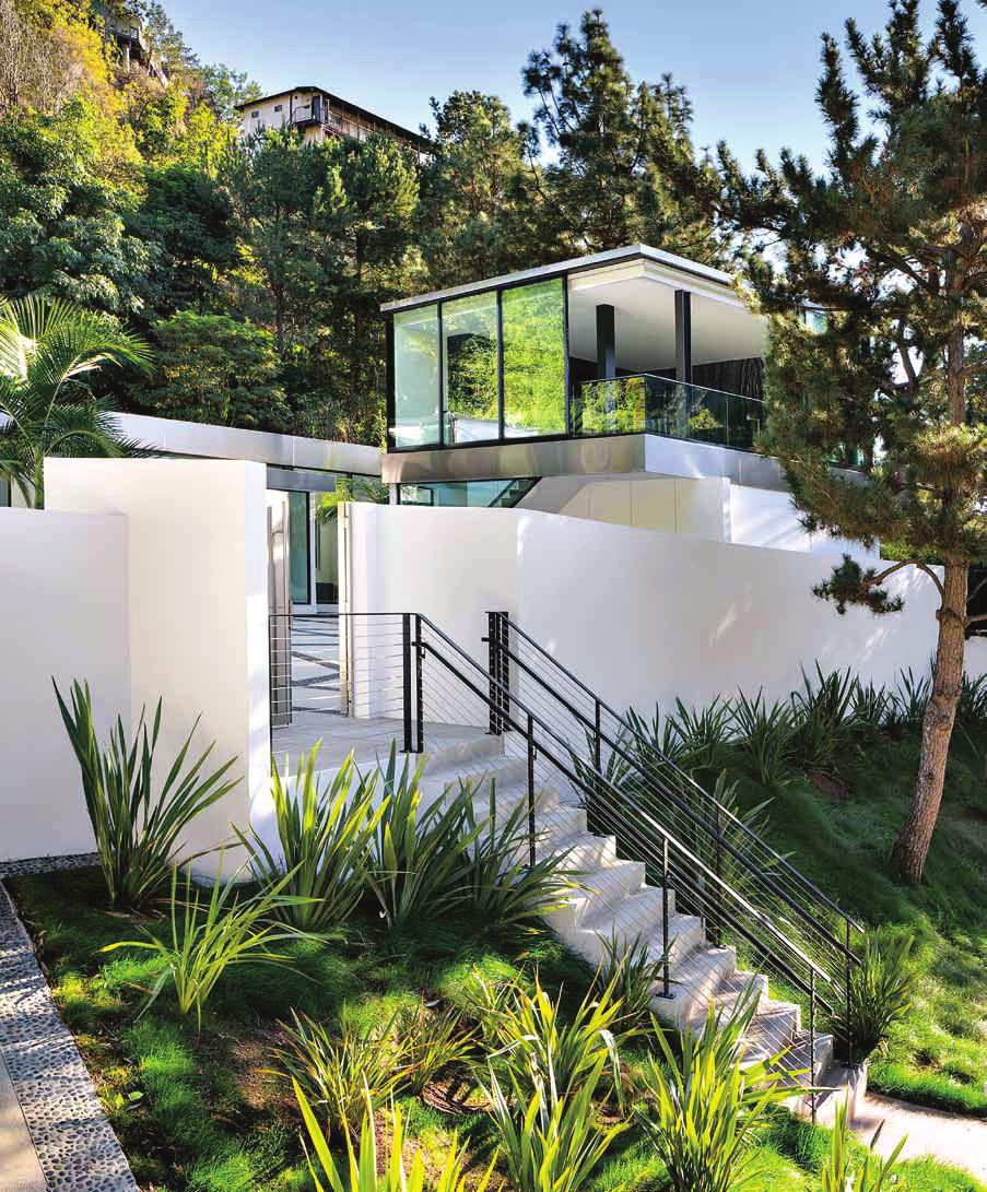 modern moves transformed by strategic additions and expanses of glass, a house in los angeles gleams with a