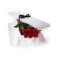 Flat Boxed Roses Half Dozen Red arrangement of six long stem red roses in a presentation