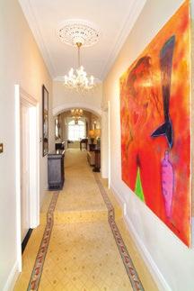 To the right of the entrance hall is a double bedroom currently used as a dressing room and the master bedroom suite.