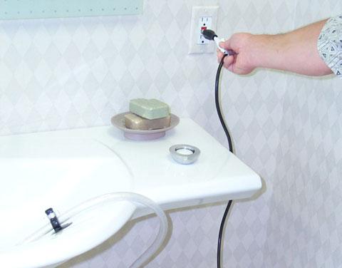 Turn off the foot bath by pushing the ON/OFF button. 2. Unplug the foot bath from the electrical outlet and store the cord. 3.