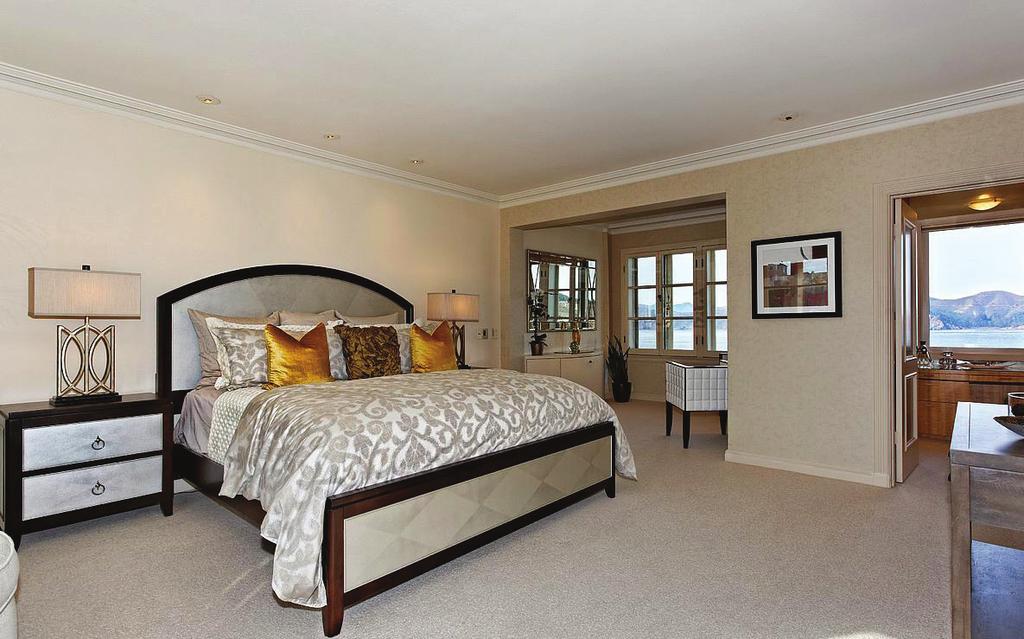 Off this bedroom, the BATHROOM boasts tile floor, Kohler toilet, sink, shower over tub with tile surround, medicine cabinet with mirror and glass shelves, high ceilings, molding and garden outlook.