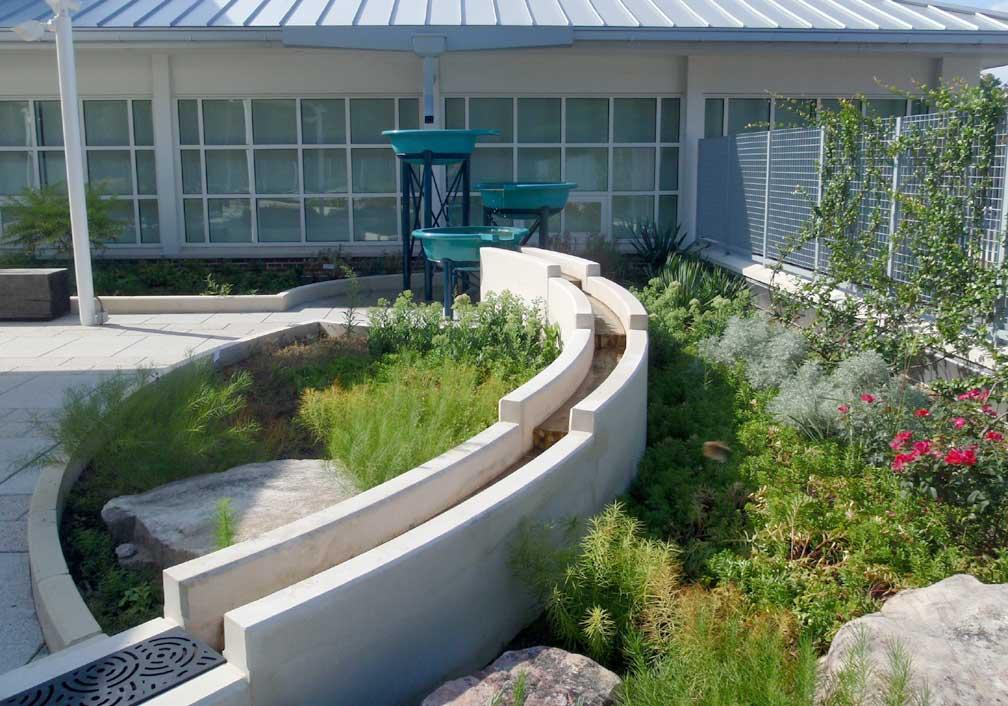 Entry Six: Lovett School Roof Hardscape Excellence The Scope of this project was to incorporate a Green Roof with a City School