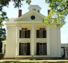 GREEK REVIVAL-FEATURES Entry, full-height, or full-building width porches Entryway columns sized in