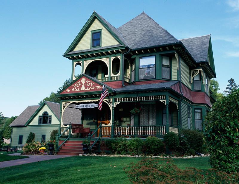 QUEEN ANNE-FEATURES Steep cross-gabled roofs, Towers Vertical windows Inventive, multistory