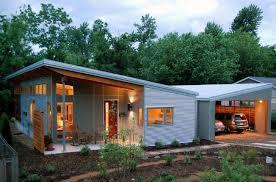 SHED-FEATURES Multiple roofs sloping in different directions Wood shingle,
