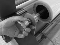 Press the Run button and adjust the supply roll tension knobs by rotating clockwise or counterclockwise.
