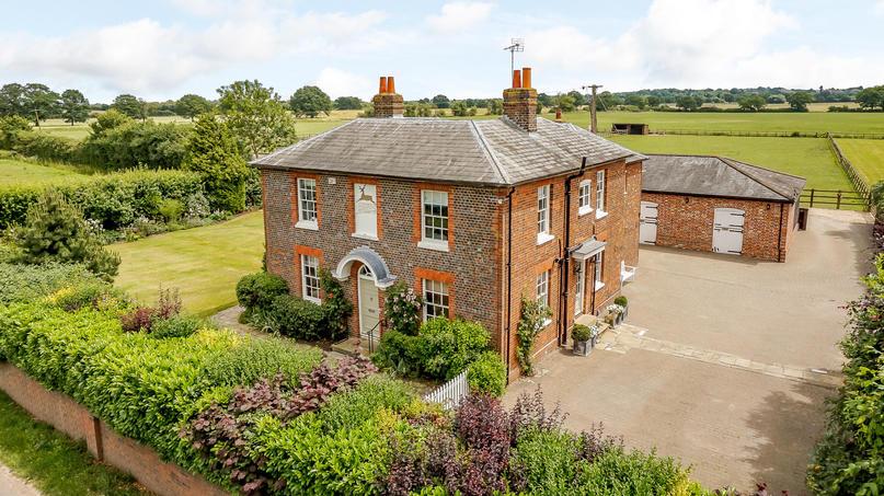GRADE II LISTED FARMHOUSE WITH ADJOINING EQUESTRIAN FACILITIES