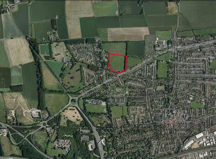 The Site The site consists of approximately 6 hectares (14 acres) of arable land located to the north of Swanland Road and