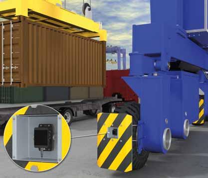 container and reduce the spreader dropping speed when approaching the