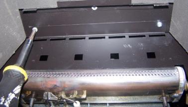 below), to the slide control then remove the burner from the assembly by removing the three screws