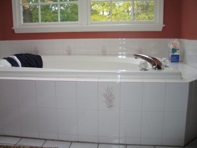 Is That Really the Same Tub? Before-Tub is Old and Dated After-Existing Tub Reused in a Completely New Way Deciding if the layout was going to change was the first step for this major makeover.