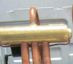 10. COMPONENT: REVERSING VALVE (HEAT PUMP ONLY) DESCRIPTION: The 4-way reversing valve is a component that switches the system between cooling and heating modes.