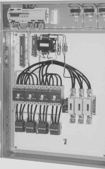 Control Panel Layout Figure 23, Typical Control Panel MicroTech II Unit Controller (3) 24V Controller Transformers Terminal Strips 110V Control Transformer (CT) S1, PS1, PS2 Switches (4) Compressor