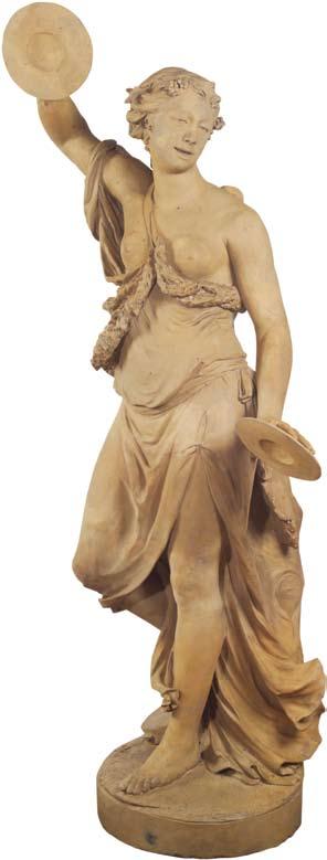 A 19th century French terracotta figure of Bacchante, circa 1860; Bacchante is a female devotee of the cult Bacchus, typically depicted with swirling drapery, playing music