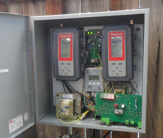 Figure 1.1: X Boiler Controller The controller being studied is a dual set-point controller, and has two tank water temperature set-points, referred to here as high temperature and low temperature.