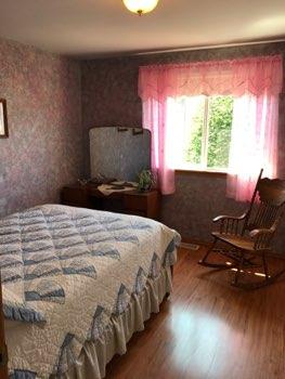1. Location Location Southwest Bedroom 3 2. Bedroom Room Walls and ceilings appear in good condition overall. Flooring is laminate wood grain material.
