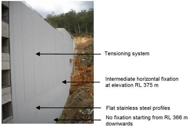Figure 11. View of the upstream face of Meander Dam during erection of the precast panels. The Meander Dam designers adopted the same philosophy adopted at Burnett River Dam, i.e. of separating the watertight function, provided by an upstream impervious geomembrane, from the static function, provided by the concrete.
