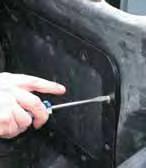 Using an awl (a punch tool), punch through one of the holes from inside the unit.