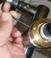 Tighten the M5 grub screw located on the back of the Swivel spout so it can engage within the locator groove