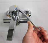 line with the flow of water) using a 3mm Allen key or a flat head screw driver.