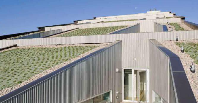 This project has a sloped green roof that controls storm water drainage, filters pollutants and carbon