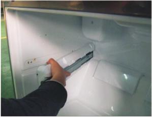 (If your refrigerator has an icemaker, remove the icemaker first) 2. Remove the plastic guide for slides on left side by unscrewing phillips head screws. 3.