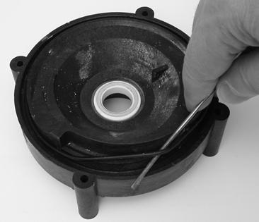 8. To remove the outlet and impeller housings and rubber o-ring: a) Remove the four screws and hex