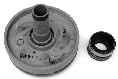 NOTE: When replacing the impeller seal assembly, twist it onto the impeller shaft so that the edge is