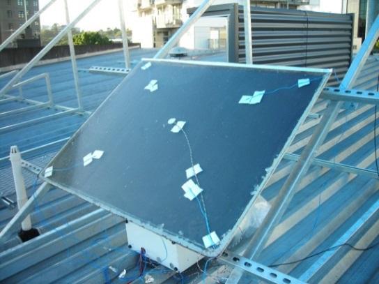 The mechanism of condensation in a solar thermal flat plate is principally driven by the release of heat into the atmosphere by radiation, particularly at night.