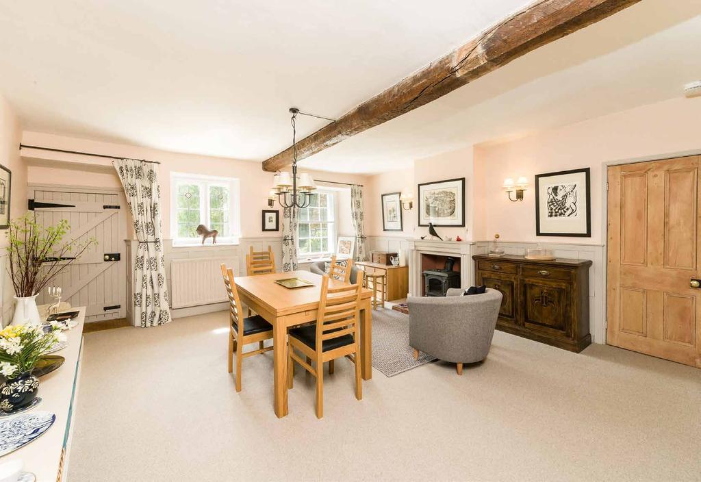 Extensive restoration has taken place over the years with historic features, including a stone spiral staircase and original 1628 door, sympathetically blended with a modern touch to create a