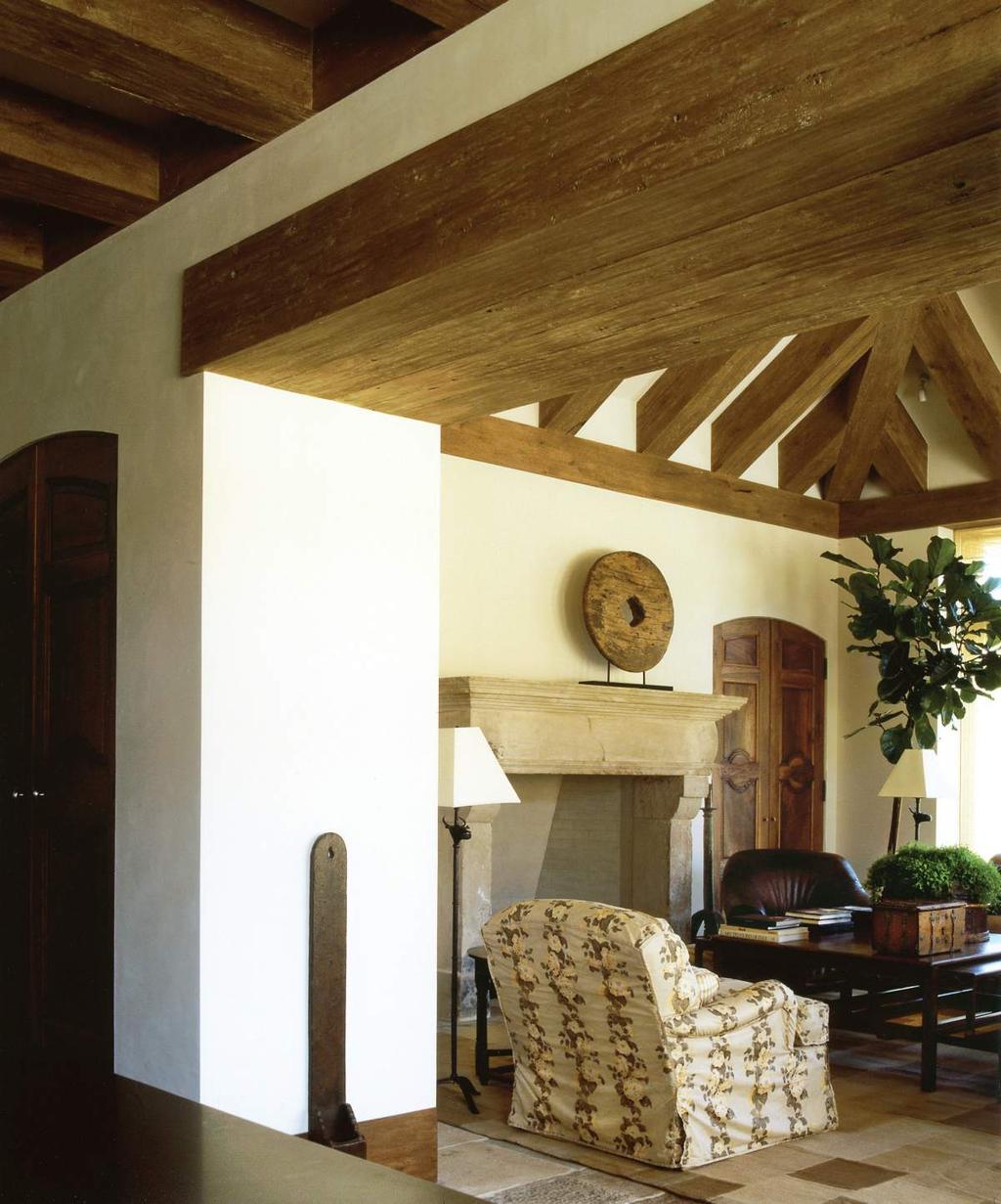 MICHEL ARNAUD A reclaimed hemlock beam between the kitchen and family room