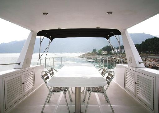 All weather al fresco dining Top deck is something else, a semi hard and soft top allows full shading for dining and full sun for suntaning.