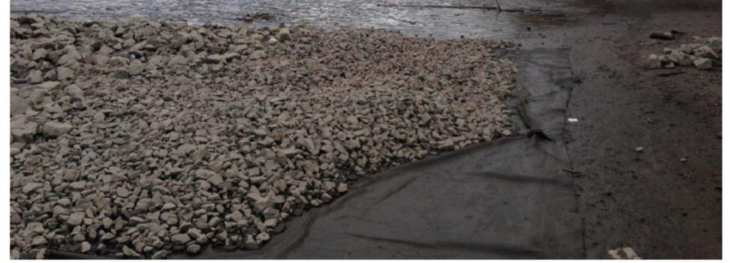 When placing the geotextile panel: CPG s contractor laid the panels out flat to extend approx.