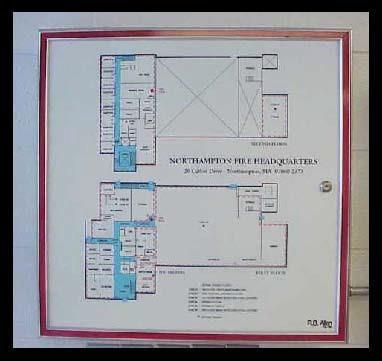 KEY) An approved fire alarm annunciator panel, with a permanently mounted graphic representation of the building above it, must be located directly inside the fire service entrance.