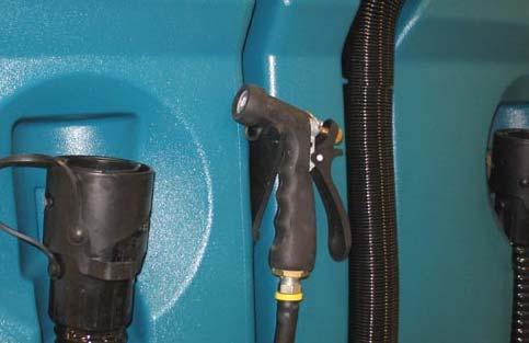 The machine and / or the spray nozzle assembly could be damaged if the spray nozzle hose is released and allowed to rapidly retract into the machine. 5. Place the spray nozzle onto the hook. 1.