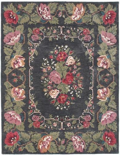 One of Manné's personal favorites in the Elements & Origins collection by Jena Hall is the Abby Lane rug from the Britain Edition shown in evergreen and crabby apple red on a boot black ground.