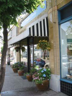 Landscaping Planters set around the entry door or at points along the storefront can accentuate the entry and add colorful interest to the storefront