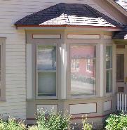 roof  Beveled bay window with Architrave molding.