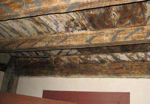 The ceiling of the old kitchen as restored with black/grey painted stripes in the 1920s. Figure 36 at left.