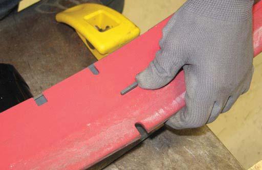 13. Install the rotated or new squeegee blade onto the squeegee assembly.