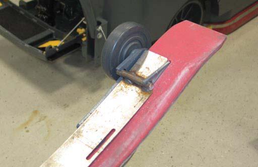Install the front squeegee retainer onto the rear squeegee assembly. 15.