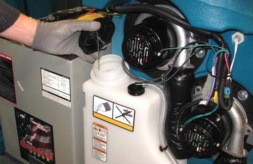 FILLING THE DETERGENT TANK (OPTION) FOR SAFETY: Before leaving or servicing machine, stop on level surface, turn off machine, set parking brake, and remove key. 1.