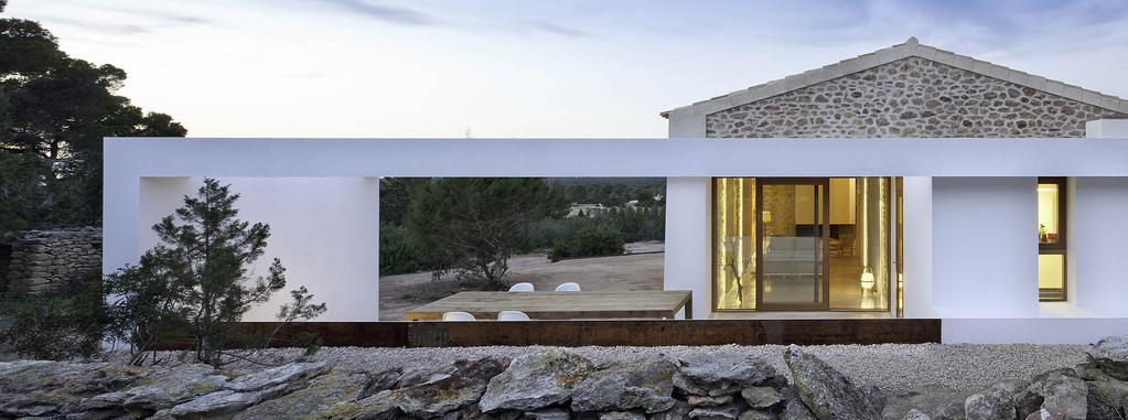 of a traditional stone-wall house located on the Spanish island of